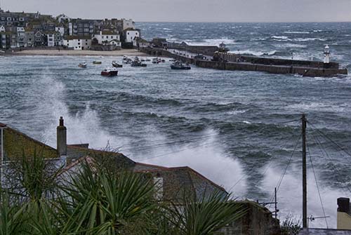 Worst storm is St Ives for 30 years as waves break over tops of houses